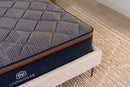 Brooklyn Bedding Copperflex mattress on frame with wood floor.